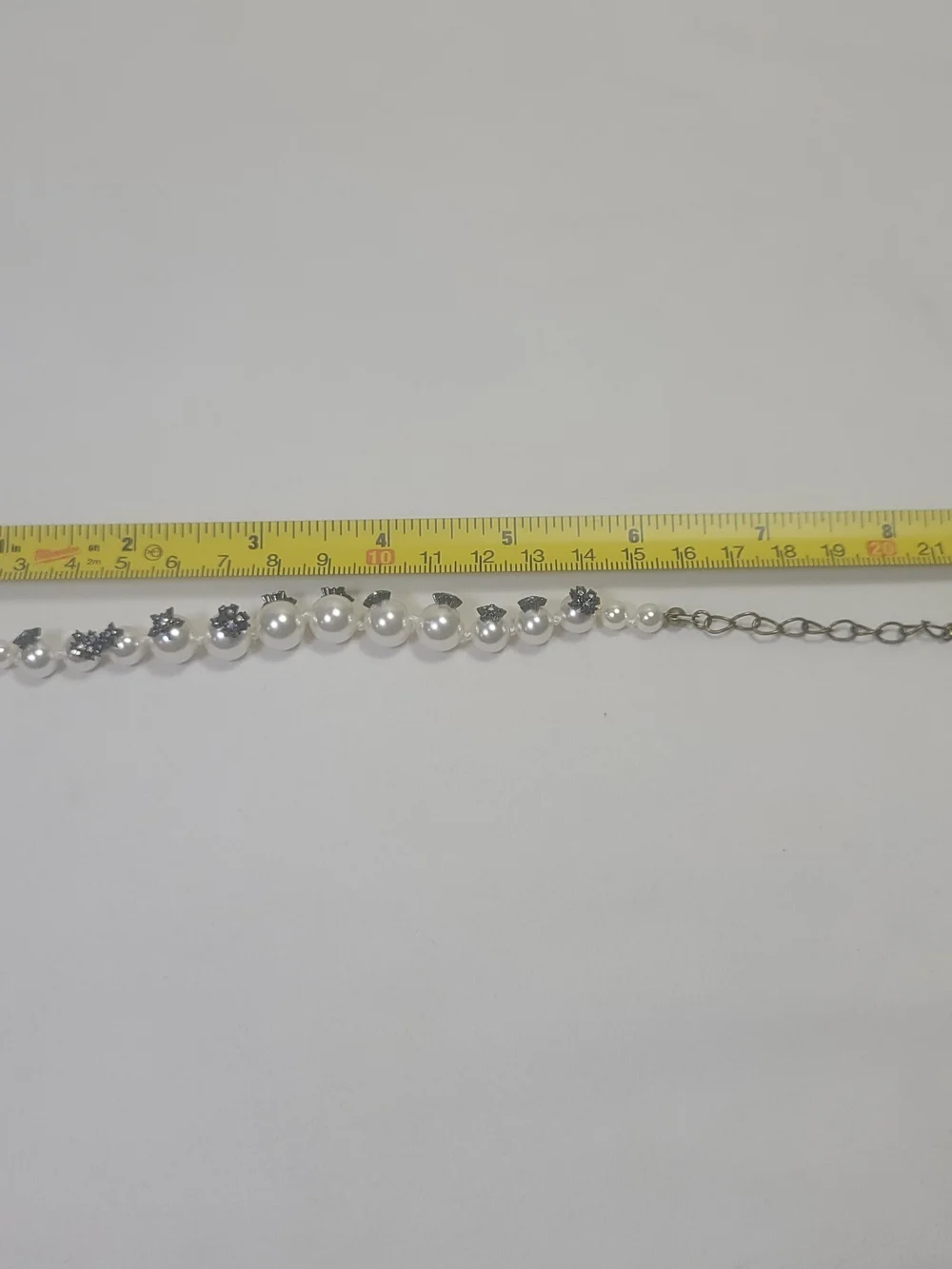 Faux Pearl Designer Star Burst Rhinestones Bracelet